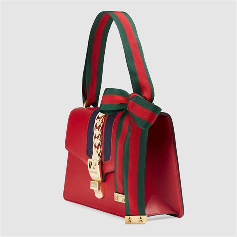 gucci sylvie red replica|gucci bag counterfeit logo.